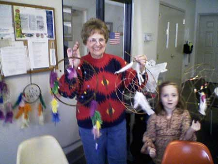 Director, Eloise Kuhn displays some dream catchers made at a Syracuse-Wawasee Historical Museum function